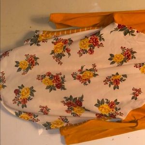 creamy orange medium shirt (Can fit a large)